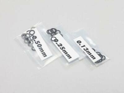 Amazon.com: 5mm Spacer Shim Set (0.05, 0.1, 0.2mm) / Yokomo